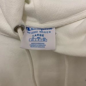 Large white champion sweatshirt. Never worn. New